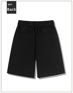 Detail view of the back of black casual shorts featuring welt pockets and elastic waist