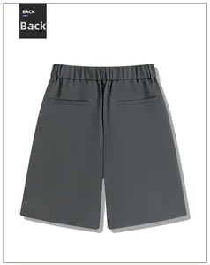 Detail view of the back of dark grey ice silk shorts with elastic waist and pockets