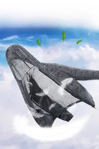 Detail of grey sun protection jacket with palm leaf texture against blue sky background