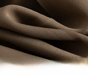 Close-up of brown ribbed texture on quick-dry ice silk suit shorts showing fabric detail