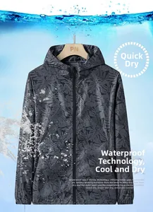 Detail view of water-resistant gray hooded sun protection jacket with leaf pattern