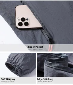 Dettaglio giacca grigia protezione solare con tasca zip, polsino elastico e cuciture