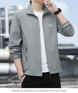 Detail of light gray men's sun protection jacket with stand collar and printed outdoor logo