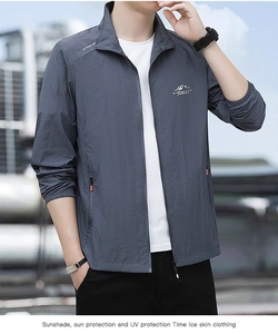 Detail of grey-blue sun protection jacket with outdoor logo and stand collar