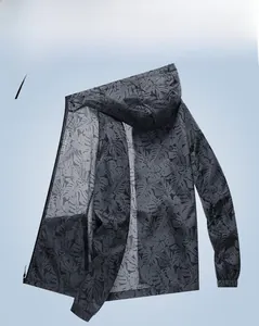 Close-up of lightweight men's sun protection jacket in maple leaf dark grey pattern