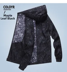 Detail of thin sun protection jacket in maple leaf black print with hood and full zipper