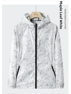 Detail of thin breathable sun protection jacket with maple leaf pattern and hood