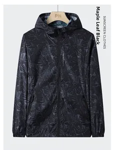 Detail of thin hooded sun protection jacket with dark grey maple leaf print pattern