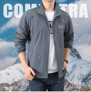 Close-up of lightweight grey sun protection jacket with outdoor logo and stand collar