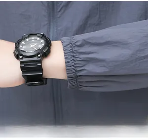 Detail of elastic cuff on men's breathable sun protection jacket with sports watch