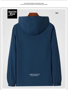 Detail view of denim blue sun protection jacket featuring windproof hood and elastic cuffs