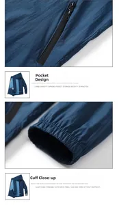 Detail of navy blue sun protection jacket with zip pockets and elastic cuffs