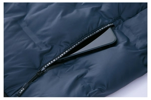 Detailed close-up of navy winter jacket zipper pocket showing large capacity for smartphone