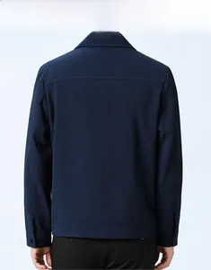 Detail view of navy blue waffle knit jacket with turn-down collar and back stitching