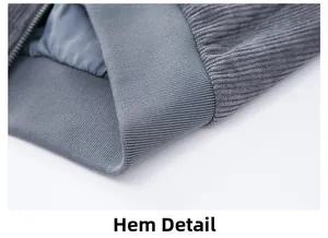 Detail view of the men's casual jacket showing premium corduroy fabric and hemline finish