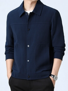 Men's navy blue waffle texture jacket with lapel collar and metal snap buttons