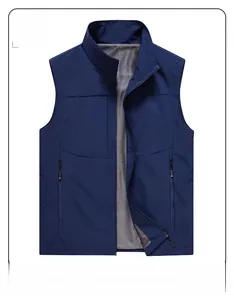 Detail shot of men's dark blue outdoor vest featuring breathable mesh lining and secure zipper pockets