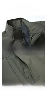 Detail of olive green tactical vest showing stand-up collar and breathable mesh lining