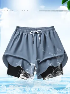 Detail of blue quick-dry shorts showing breathable fabric and inner compression layer