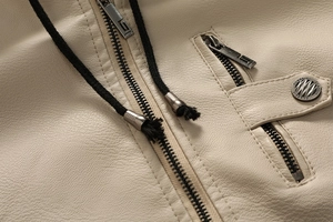 Detail of beige faux leather jacket with metal zipper and drawstring with CLASSIC logo