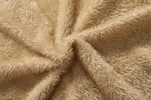 Macro view of thick khaki fleece lining showing fluffy texture and warmth detail
