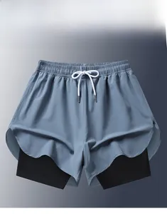 Detail of 2-in-1 men's quick-dry sports shorts featuring elastic waist and white drawstring