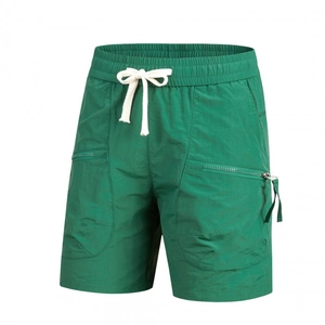 Men's ice silk quick-dry cargo shorts in deep green with elastic waist and drawstrings