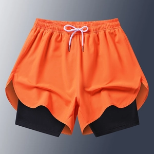 Orange layered sports shorts for men with black compression liner and elastic waistband