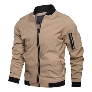 Detail of khaki bomber jacket featuring black ribbed collar and branded inner neck tag