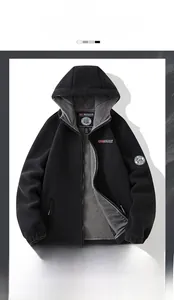 Detail of hooded fleece jacket with grey lining contrast and elastic cuffs for winter