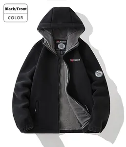 Detail of black hooded fleece jacket featuring grey thermal lining and full-zip closure