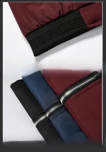 Detailed view of ribbed hem and metallic zipper on slim fit bomber flight jackets