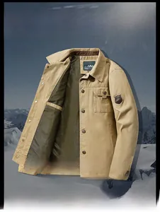Detail of khaki men's jacket showing collar, chest pocket and leather arm patch
