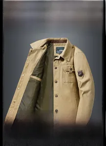 Detail of khaki men's jacket with classic collar, metal buttons and mesh lining