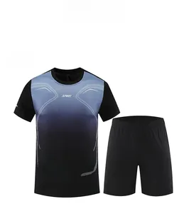 Flat lay of men's sports set with haze blue gradient t-shirt and black quick-dry shorts