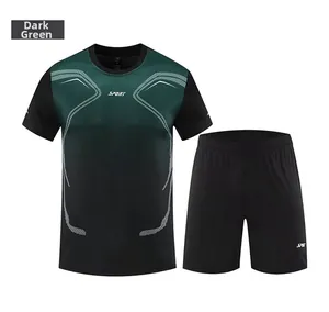 Detail view of men's dark green gradient sports suit with T-shirt and shorts set