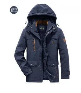 Detail of dark blue men's parka showing warm fleece lining and chest embroidery accents