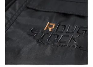Close-up of ROUGH STOCK embroidery on black windproof fabric of men's winter coat