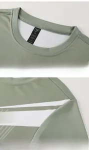 Dettaglio del collo della maglietta sportiva verde con etichetta XL e tessuto a rete traspirante