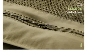 Detail of khaki outdoor vest showing breathable mesh fabric and zippered stowable design