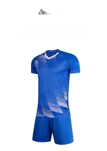 Detail view of blue and white breathable football kit with geometric gradient pattern
