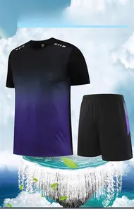 Detail of quick-dry sports set showing gradient purple t-shirt and black athletic shorts