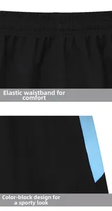 Detail of men's athletic shorts featuring elastic waistband and blue color-block design