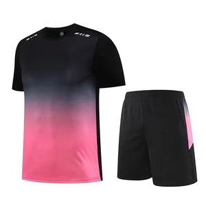 Men's sports set with quick-dry gradient pink and black t-shirt and athletic shorts