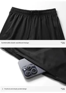 Détail du short de sport en maille respirante noire avec poche latérale profonde pour téléphone
