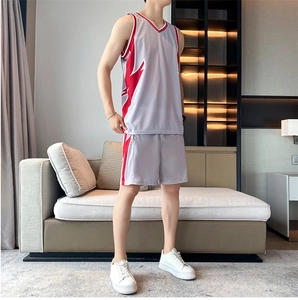 Detail of grey quick-dry basketball jersey set with red and white geometric side patterns