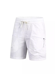 Detailed view of white quick-dry cargo shorts with elastic drawstring waist and side pockets
