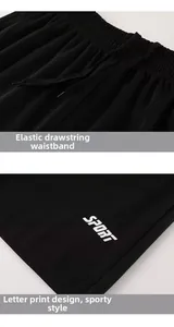 Détail du short noir séchage rapide homme avec taille élastique et imprimé lettres SPORT