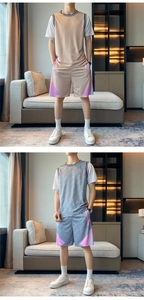 Détail d'un ensemble de sport pour homme avec t-shirt à faux effet de couches et short