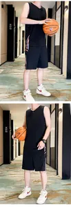 Detail of men's black basketball set with breathable fabric and tricolor side stripes